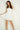 Magasinez la robe courte à volants de Colori - Shop the short ruffled dress from Colori