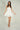 Magasinez la robe courte à volants de Colori - Shop the short ruffled dress from Colori