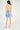 Magasinez la robe courte à volants de Colori - Shop the short ruffled dress from Colori