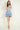 Magasinez la robe courte à volants de Colori - Shop the short ruffled dress from Colori
