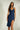 Magasinez la robe midi à encolure cache-coeur de Colori - Shop the midi wrap dress from Colori