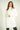 Magasinez la robe courte en tricot de Colori - Shop the short knit dress from Colori