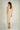 Magasinez la robe portefeuille brillante de Colori - Shop the shiny wrap dress from Colori