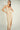 Magasinez la robe portefeuille brillante de Colori - Shop the shiny wrap dress from Colori