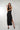 Magasinez la robe maxi brillante de Colori - Shop the shiny maxi dress from Colori
