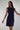 Magasinez la robe mini avec noeud de Colori - Shop the mini dress with front knot from Colori