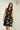 robe-noir-or-cache-coeur-sans-manches-Colori-sleeveless-black-gold-wrap-dress-Colori-front