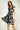 Magasinez la robe portefeuille sans manches de Colori - Shop the sleeveless wrap dress from Colori