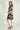 Magasinez la robe portefeuille sans manches de Colori - Shop the sleeveless wrap dress from Colori