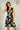 Magasinez la robe cache-coeur fleurie de Colori - Shop the floral wrap dress from Colori