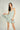 Magasinez la robe fleurie à col licou de Colori - Shop the floral halter-neck dress from Colori