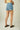 Magasinez le short en denim de Colori - Shop the denim short from Colori