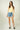 Magasinez le short en denim de Colori - Shop the denim short from Colori