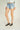 Magasinez le short en denim de Colori - Shop the denim short from Colori