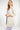 Magasinez le veston long à manches trois-quarts de Colori - Shop the long three-quarter sleeve blazer from Colori