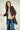 Magasinez le veston long à manches trois-quarts de Colori - Shop the long three-quarter sleeve blazer from Colori