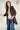 Magasinez le veston long à manches trois-quarts de Colori - Shop the long three-quarter sleeve blazer from Colori
