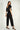 magasinez la combinaison noire de chez colori - shop the jumpsuit for women from colori