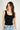 magasinez la camisole courte côtelée de Colori - shop the ribbed crop camisole from Colori