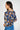  Magasinez le haut fleuri à manches chauve-souris de Colori - Shop the batwing sleeve floral top from Colori