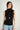 Magasinez le haut sans manches à col montant  de Colori - Shop the sleeveless mock neck top from Colori