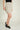 Magasinez la jupe courte à texture bouclée de Colori - Shop the short skirt with bouclé texture from Colori