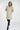 Magasinez le long manteau beige bouffant de chez Colori - Shop the long beige puffer jacket from Colori