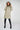 Magasinez le long manteau beige bouffant de chez Colori - Shop the long beige puffer jacket from Colori