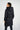 Magasinez le long manteau noir bouffant de chez Colori - Shop the long black puffer jacket from Colori
