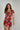 magasinez la robe fleurie à manches courtes de chez Colori - Shop the short sleeve floral dress from Colori